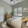Primary bedroom with modern furniture.