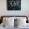 Bedroom with natural lighting and high ceilings