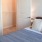 Bedroom with natural lighting and high ceilings