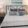 Bedroom with natural lighting and high ceilings